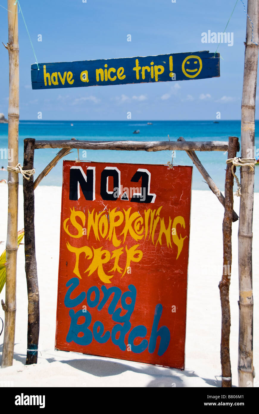 Sign advertising snorkeling trips from Long Beach on Perhentian Kecil, Malaysia Stock Photo