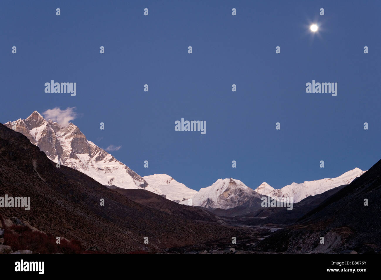 Scenic of Chukung Valley at nightime with majestic Lhotse peak seen on left side in Khumbu region Nepal Stock Photo