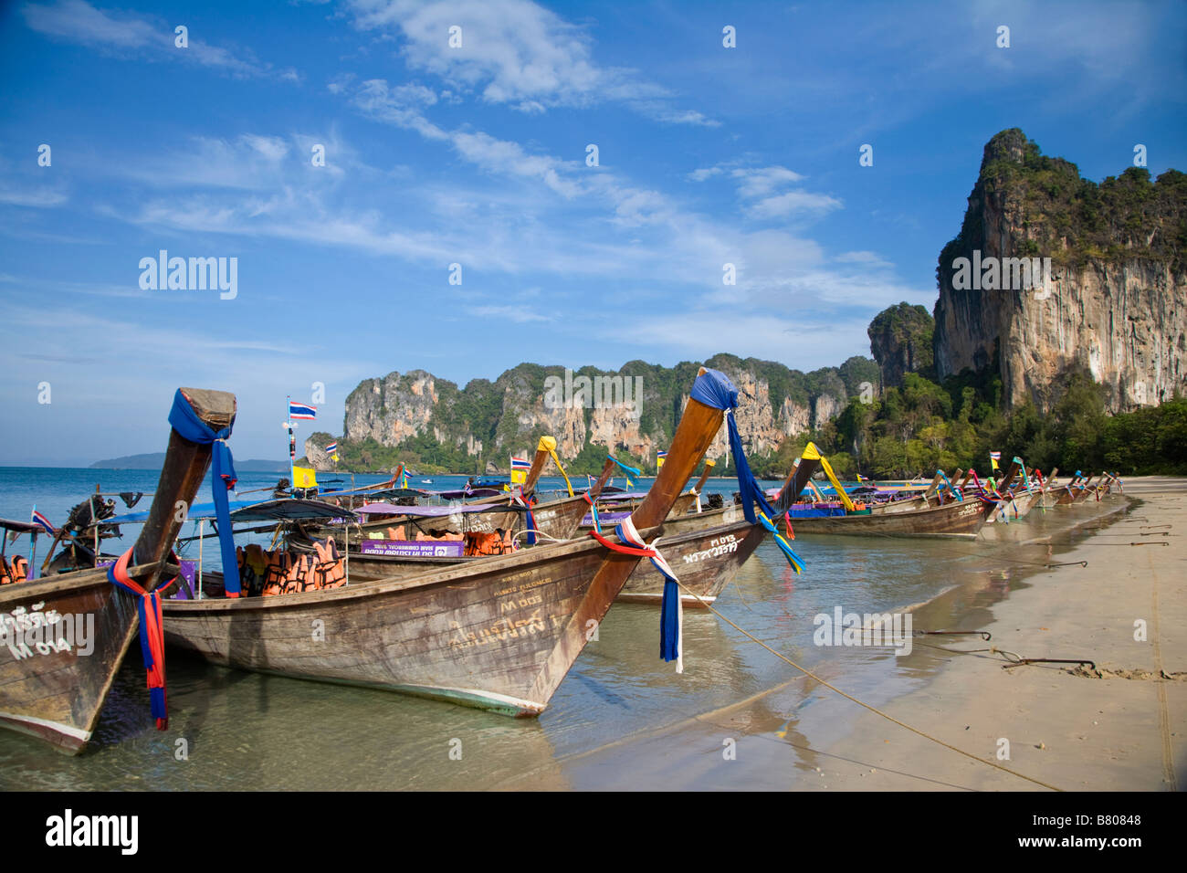 Thailand, Krabi, Railay Beach, boat, sea, sun, tranquility, beach, bay, paradise, exotic, asia, tropical, long tail boats Stock Photo