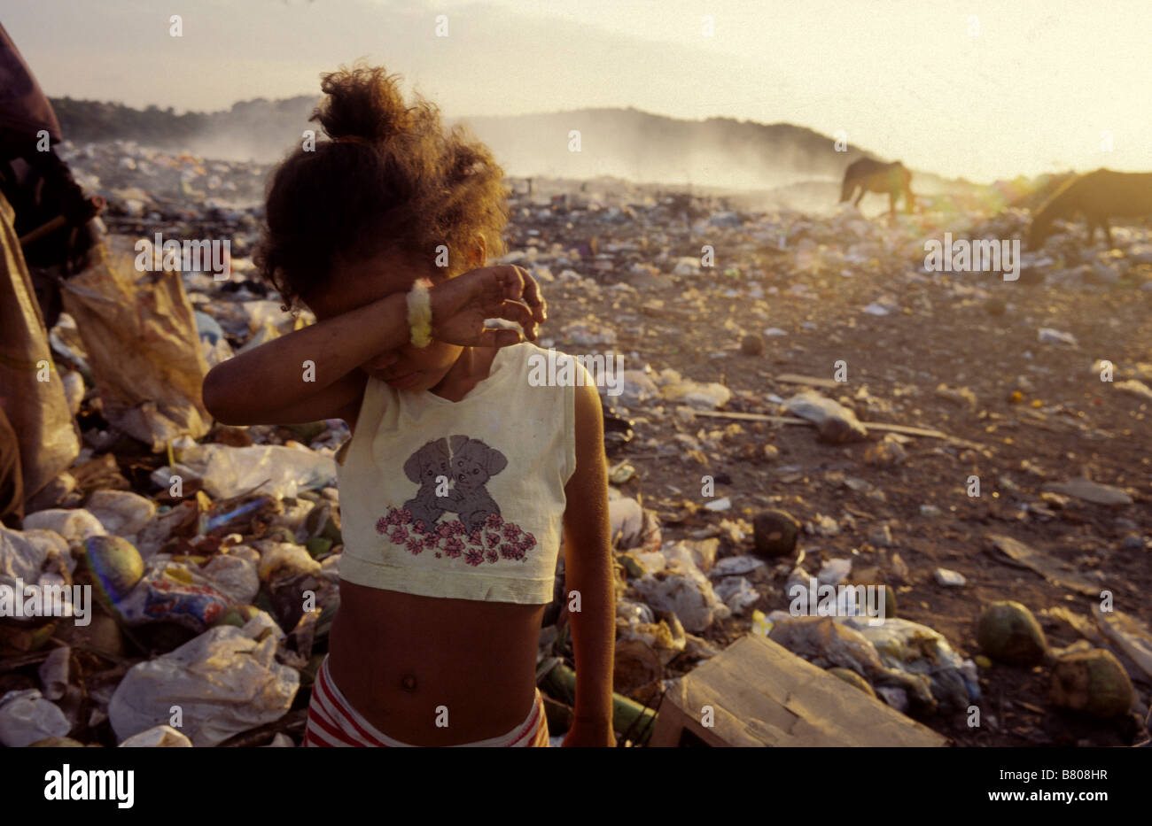 Child labor poor girl work at dump Natal city Rio Grande do Norte State Brazil Stock Photo