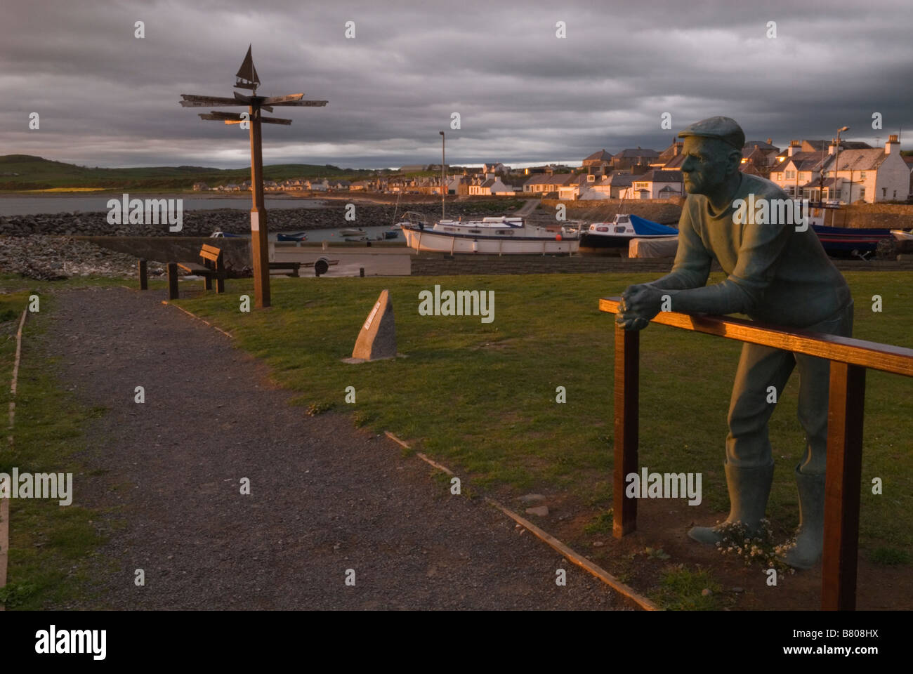 Port William seafront with the sculpture created by Andrew Brown
