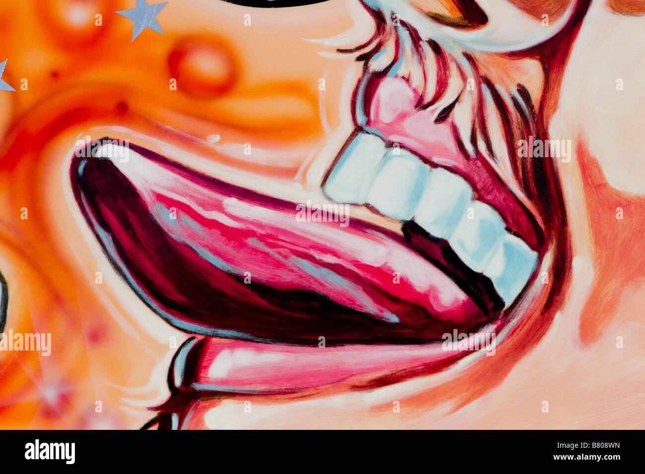 Man sticking tongue out painted wall art Stock Photo