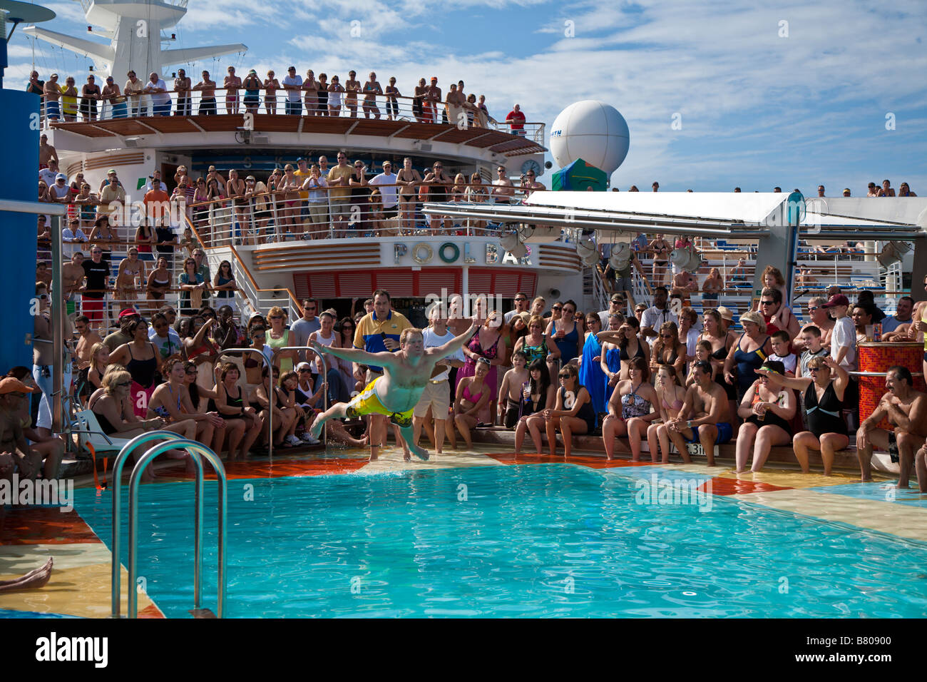 Belly flop contest on the deck of Royal Caribbean Navigator of the Seas cruise ship Stock Photo