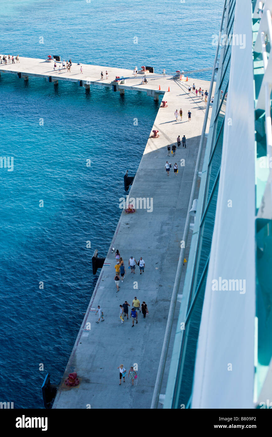 Cruise passengers disembark from Royal Caribbean Navigator of the Seas ...