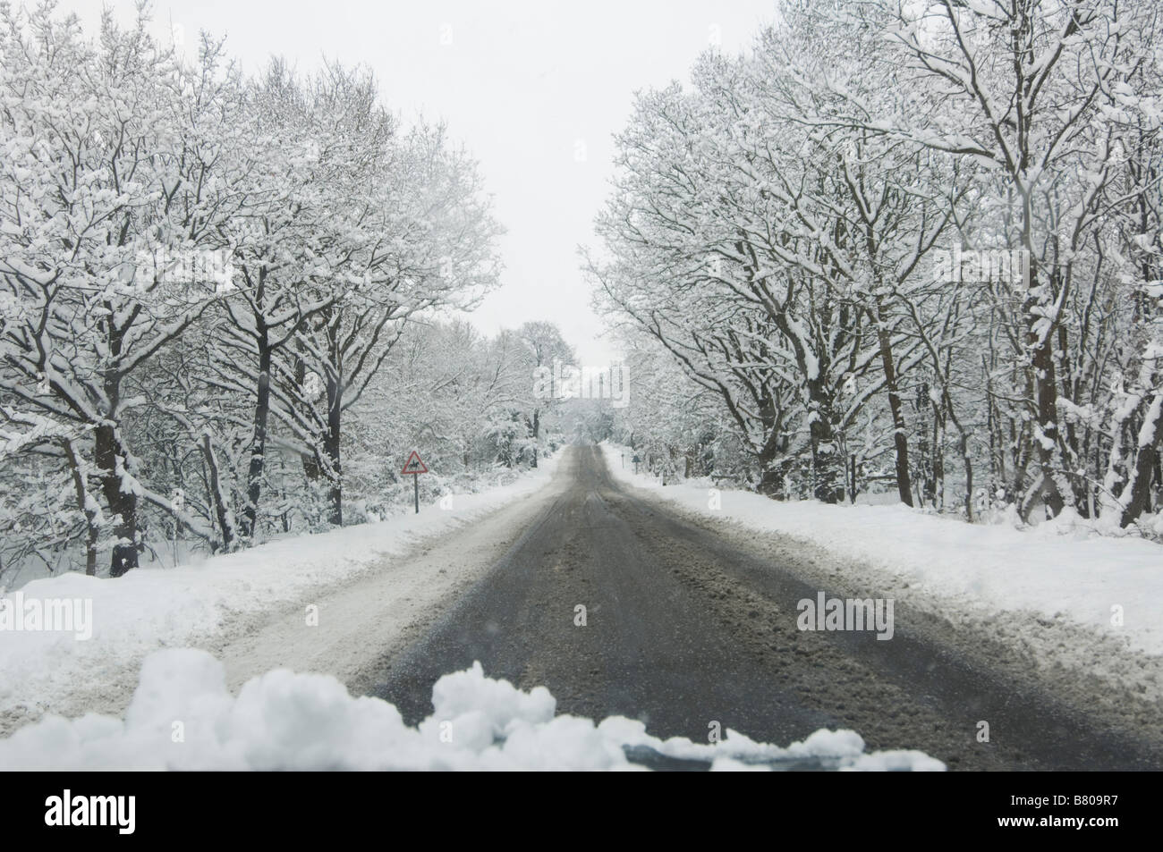 Snow Covered Country Road Surrey UK Stock Photo Alamy