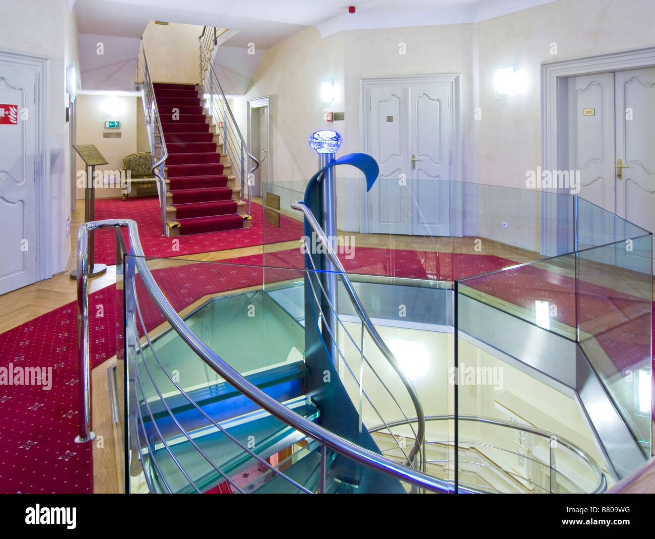 Hotel hallway with a modern staircase Stock Photo