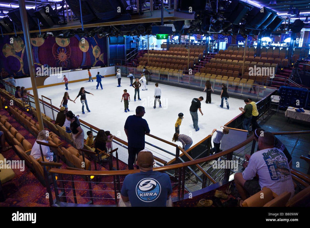 Cruise passengers ice skating during open skate session on Royal Caribbean Navigator of the Seas cruise ship Stock Photo