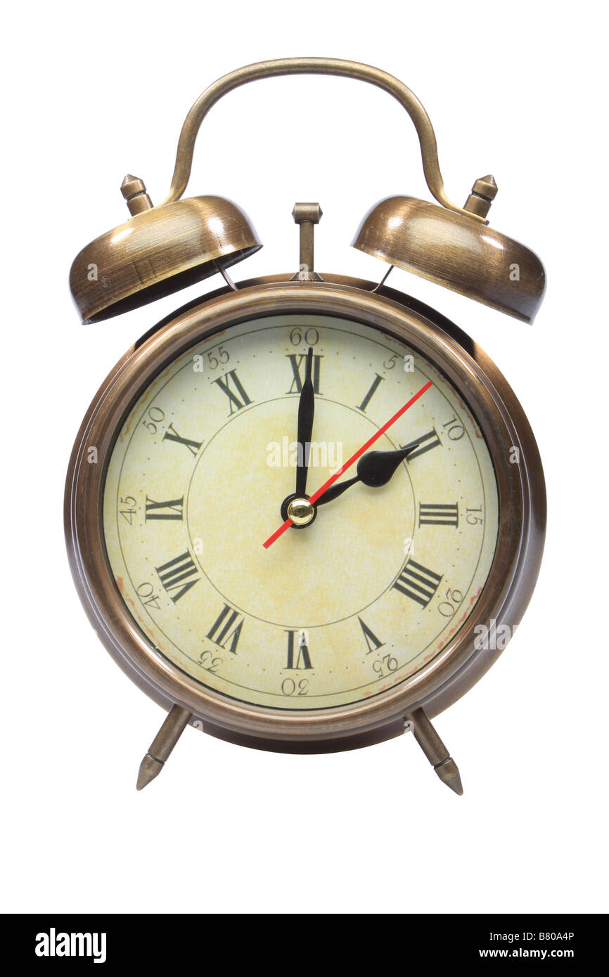 An old fashioned alarm clock at two oclock Stock Photo