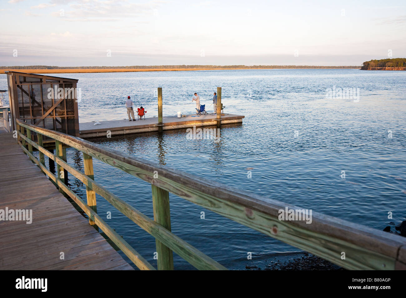Men fishing on dock at Crooked River State Park in St. Marys,