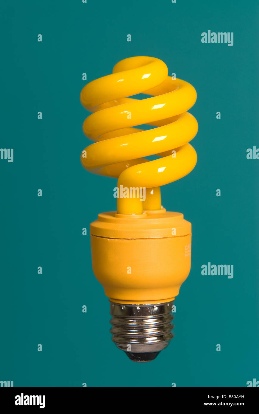 A yellow bug zapping light bulb isolated on a green background Stock