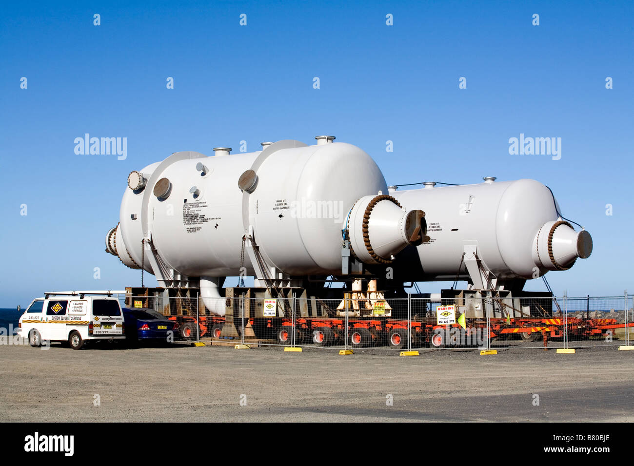 Two shell and tube heat exchanger pressure vessels waiting for transport to their destination at a Liquified Natural Gas Project Stock Photo