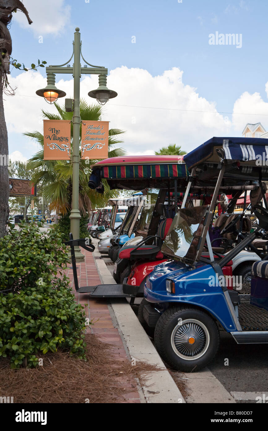 Golf carts parked along main street in The Villages retirement