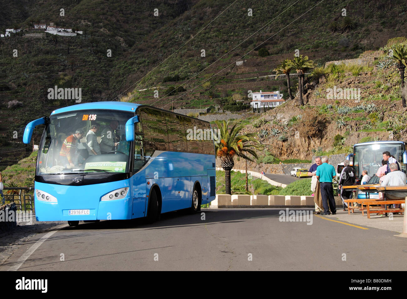 Motor coach and tourists in Masca Teno massif Tenerife Canary Islands Stock Photo