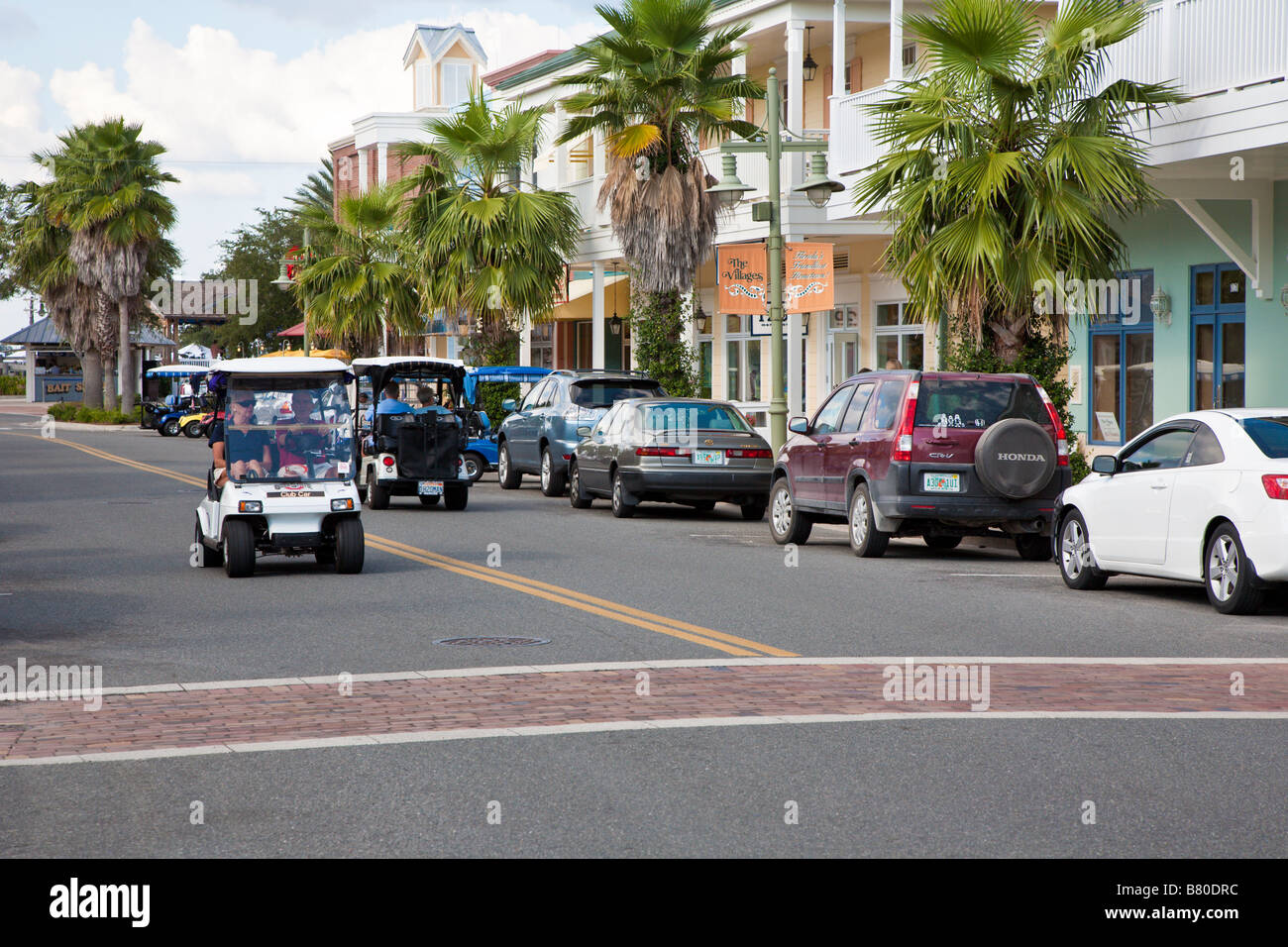 Residents drive golf carts on streets in The Villages retirement