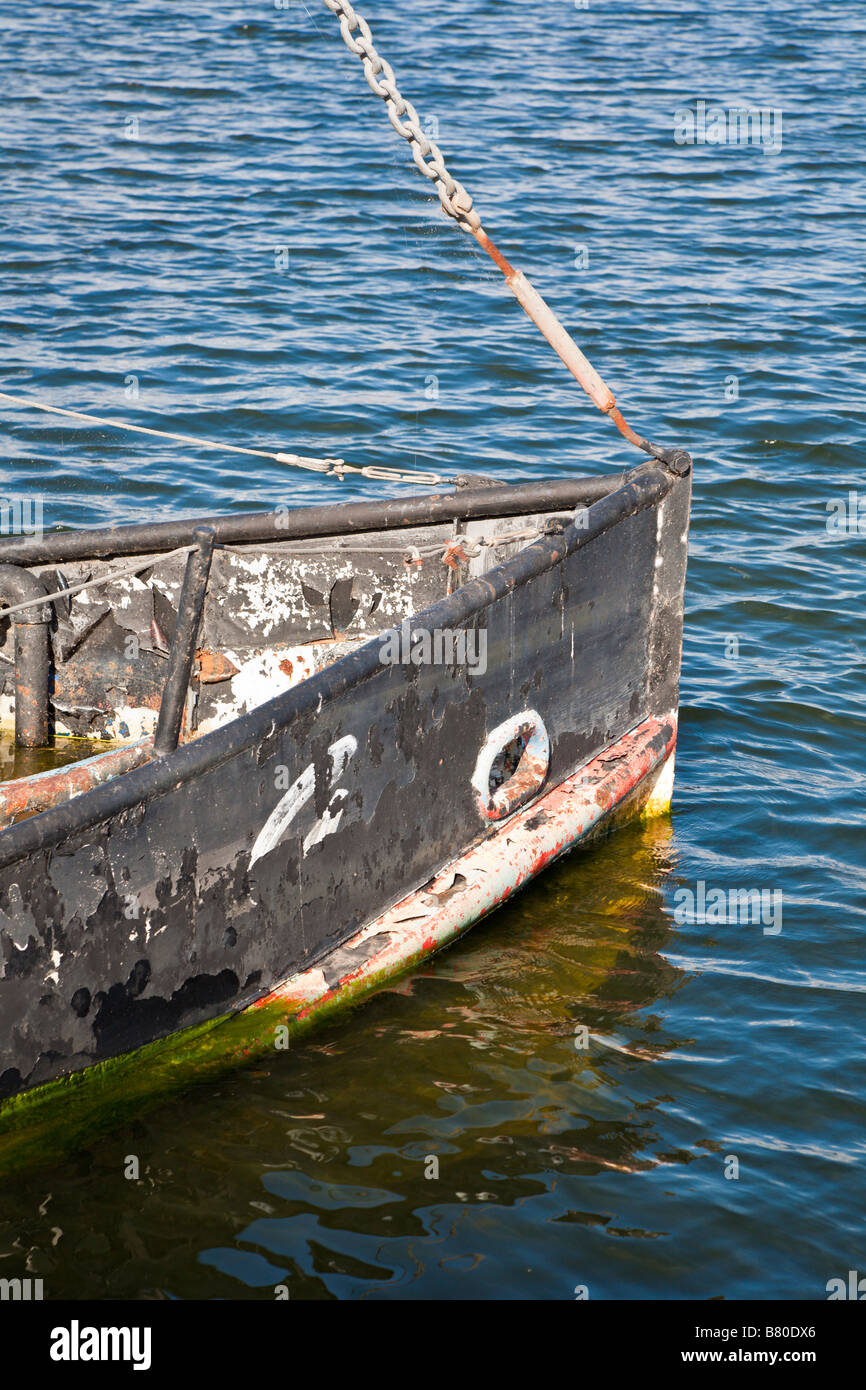 Sunken steel boat decoration in Lake Cherry in The Villages retirment community in Central Florida, USA Stock Photo