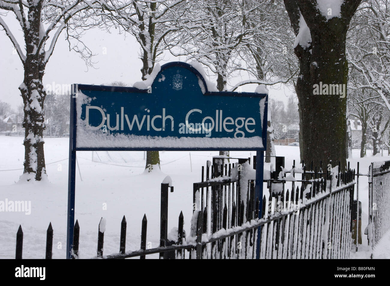 Dulwich College sign with snow Stock Photo