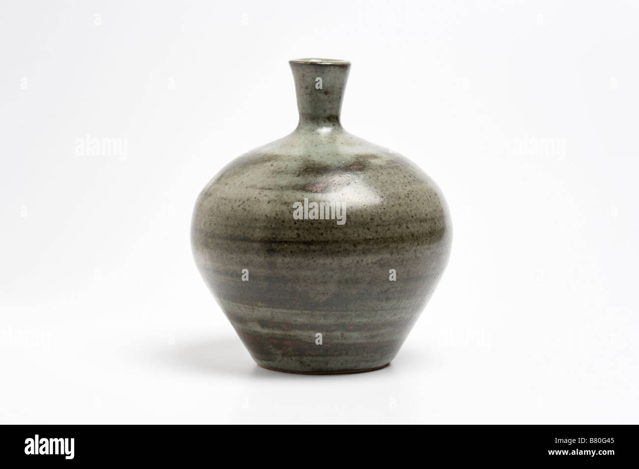 Small studio pottery vase on white background Stock Photo