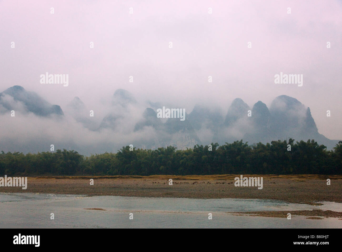 Landscape of Li River and karst hill in morning mist Guangxi China Stock Photo