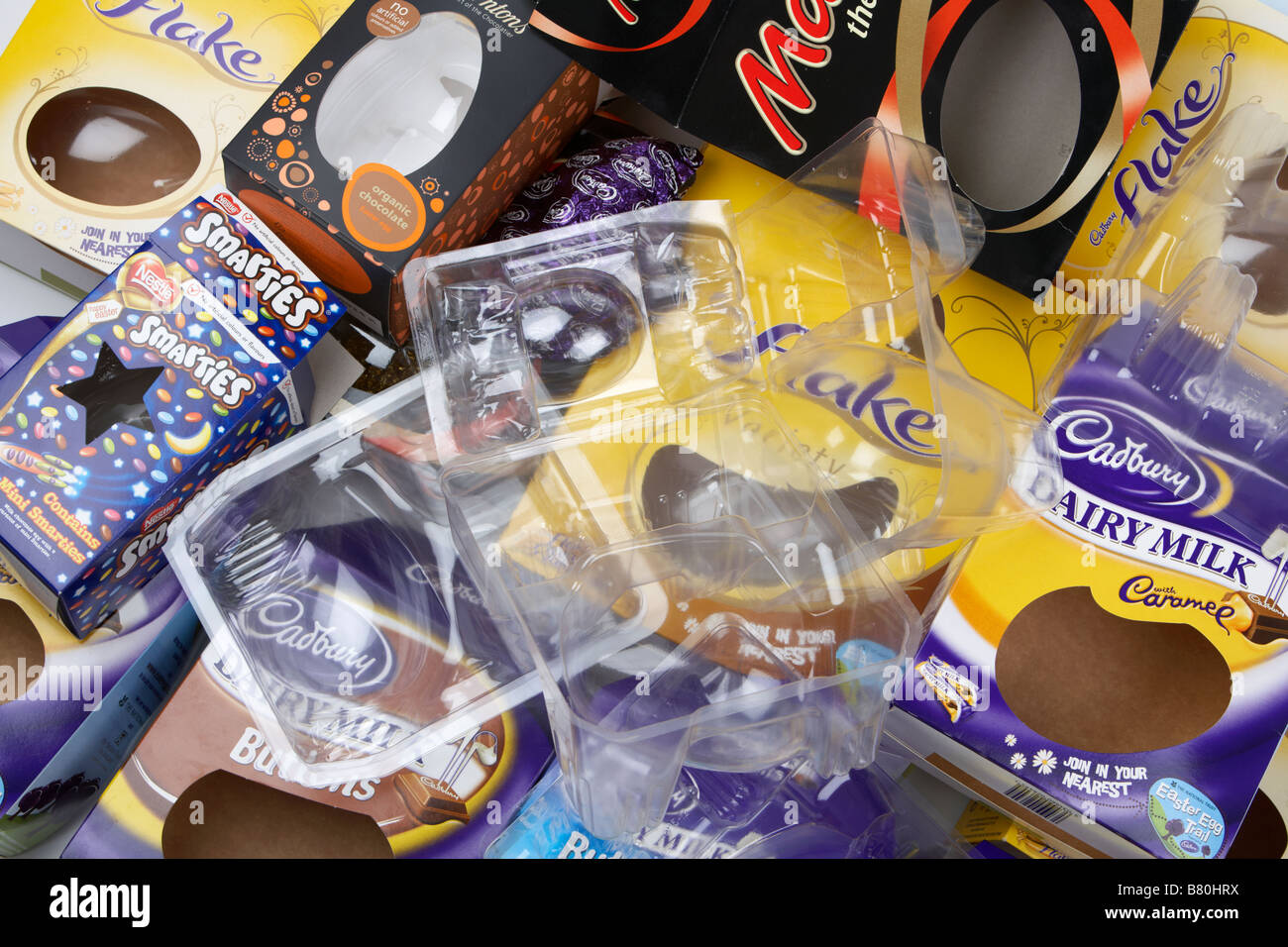 pile of various empty easter egg boxes packaging and cartons from uk manufacturers Stock Photo