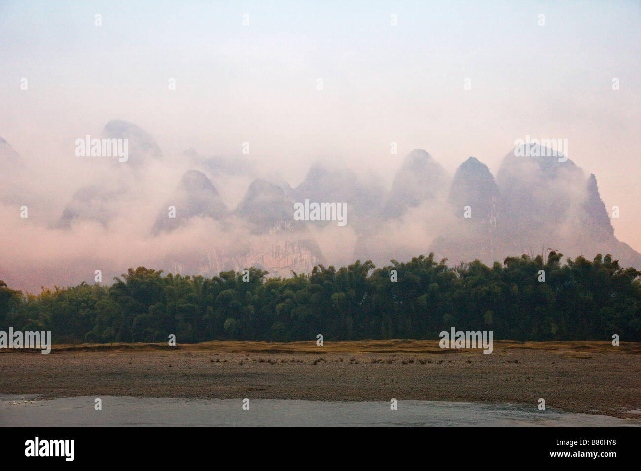 Landscape of Li River and karst hill in morning mist Guangxi China Stock Photo