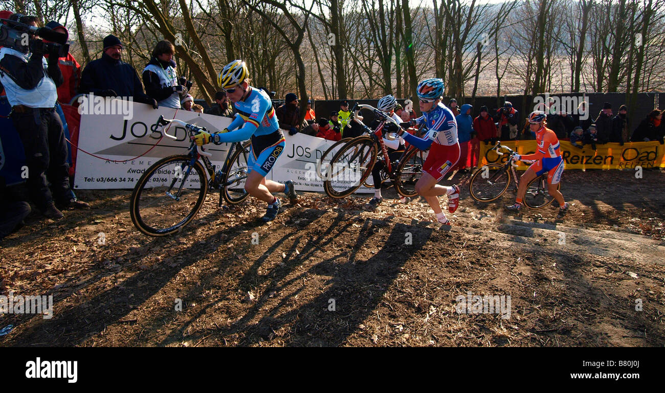 Bicyclists racing up the stairs world championship cyclecross Hoogerheide the Netherlands Stock Photo
