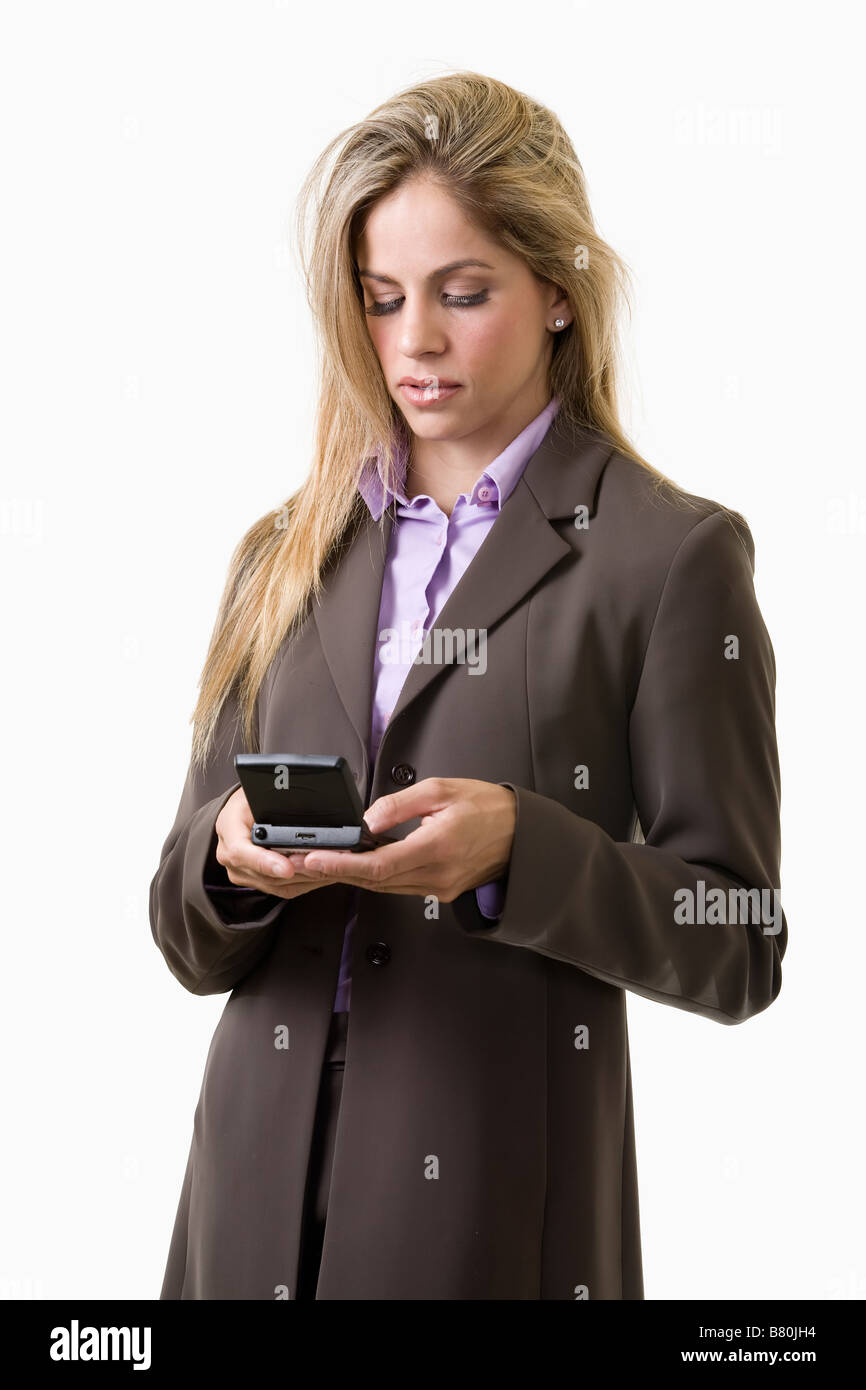 Business woman text messaging Stock Photo