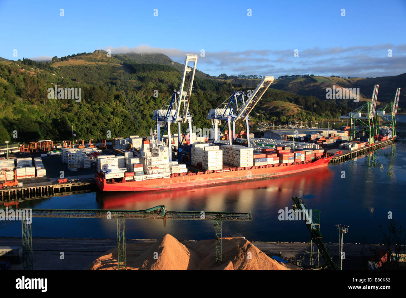 Container ship at terminal,Port Chalmers, Otago Harbour, Dunedin, South Island, New Zealand Stock Photo