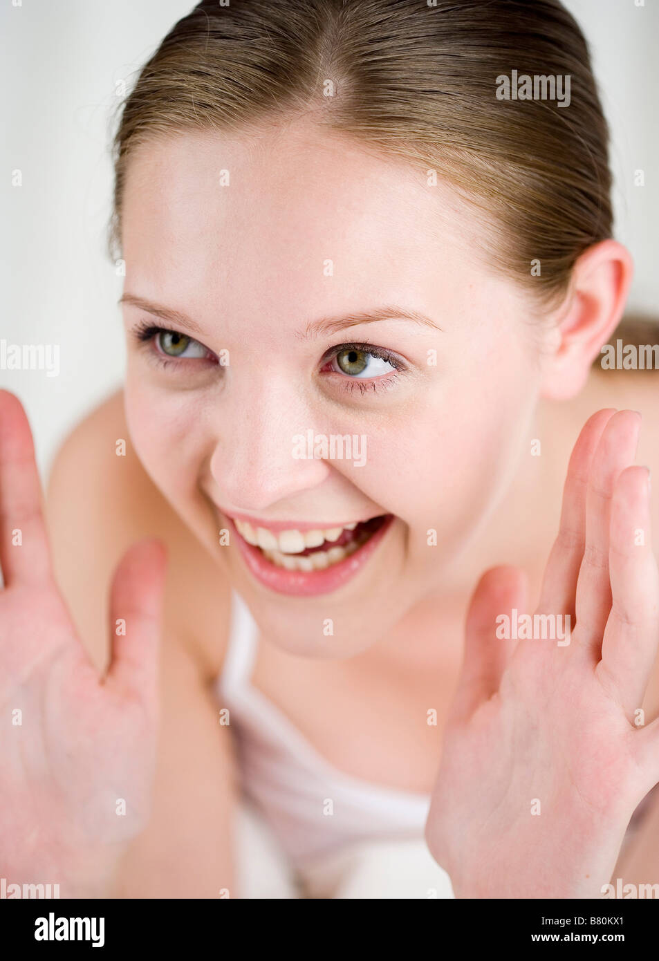 Young woman laughing close up Stock Photo