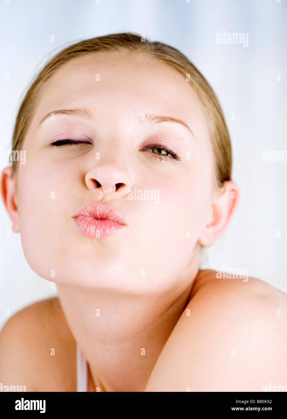 Young woman pouting toward the camera Stock Photo