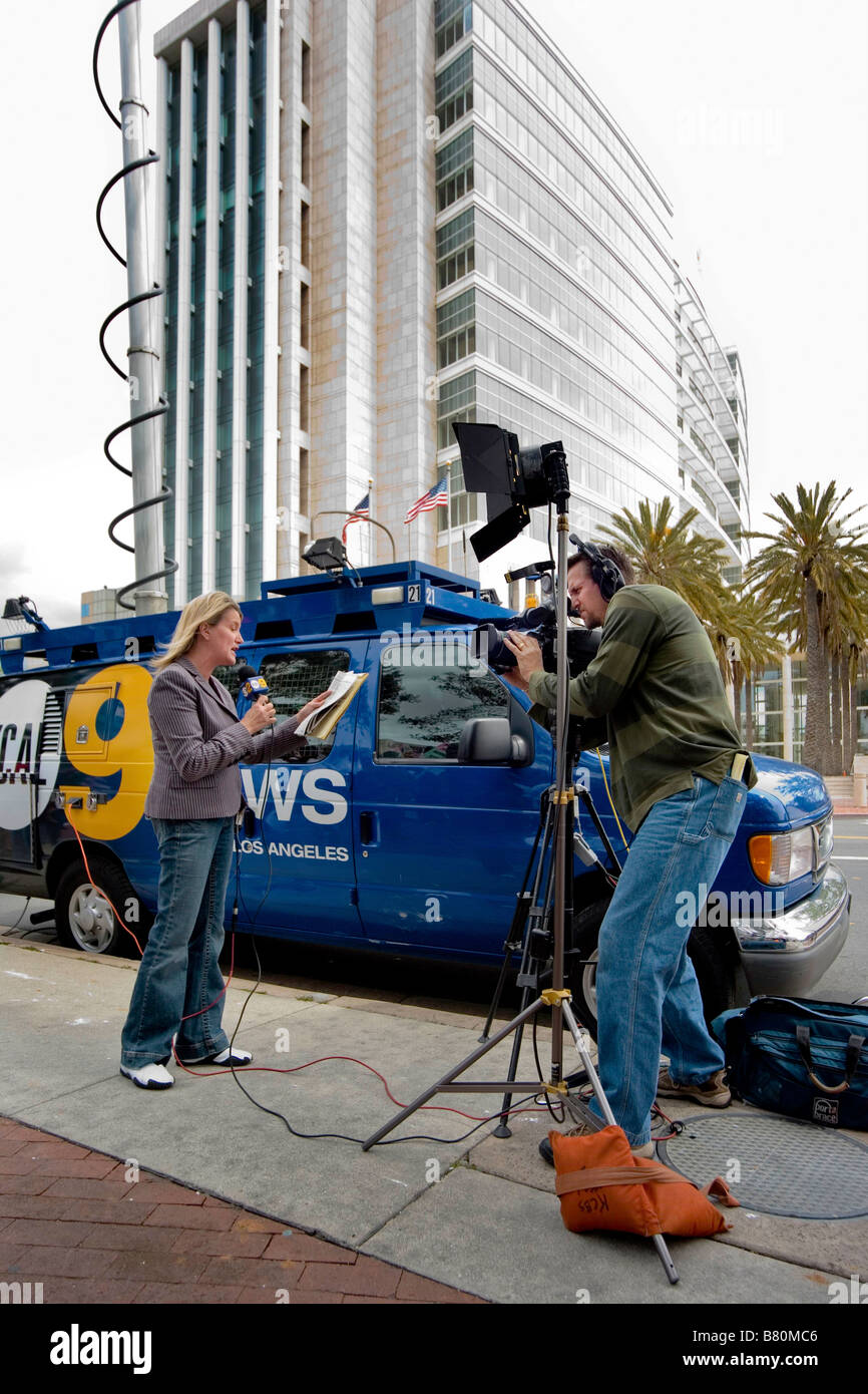 A Television News Reporter Makes An On Location Broadcast From Immigrants Rights Demonstration In Santa Ana CA Background A Television News Reporter Makes An On Location Broadcast From Immigrants Rights Demonstration In Santa Ana CA Background
