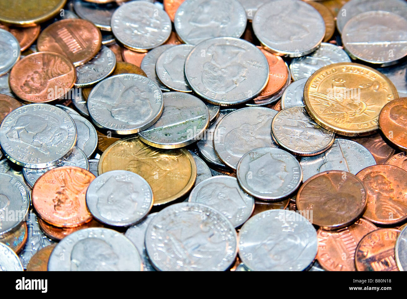 US Currency.  Pennies, Nickels, Dimes, Quarters and Dollar Coins. Stock Photo