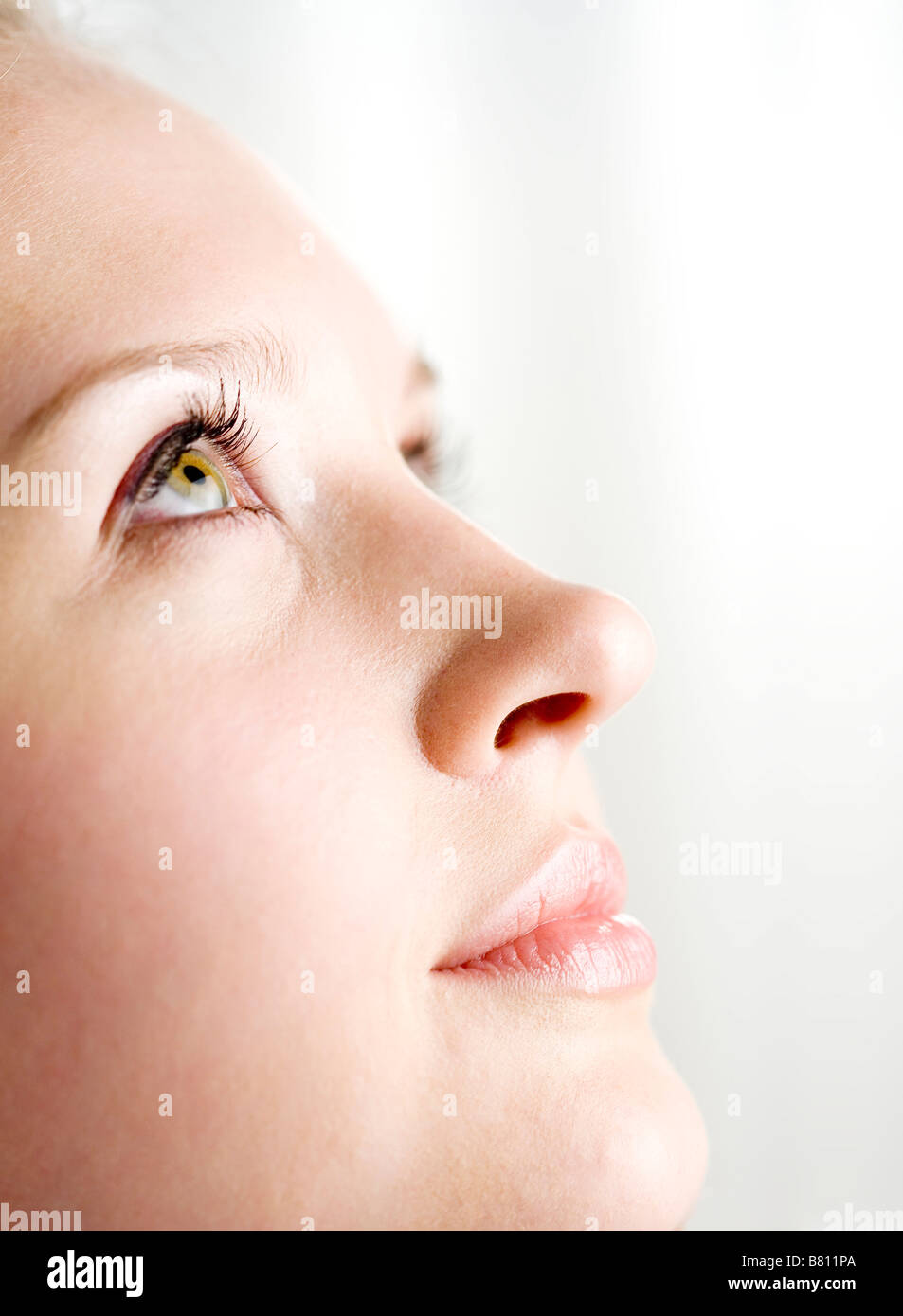 Close up to a young woman s right face side view Stock Photo Alamy