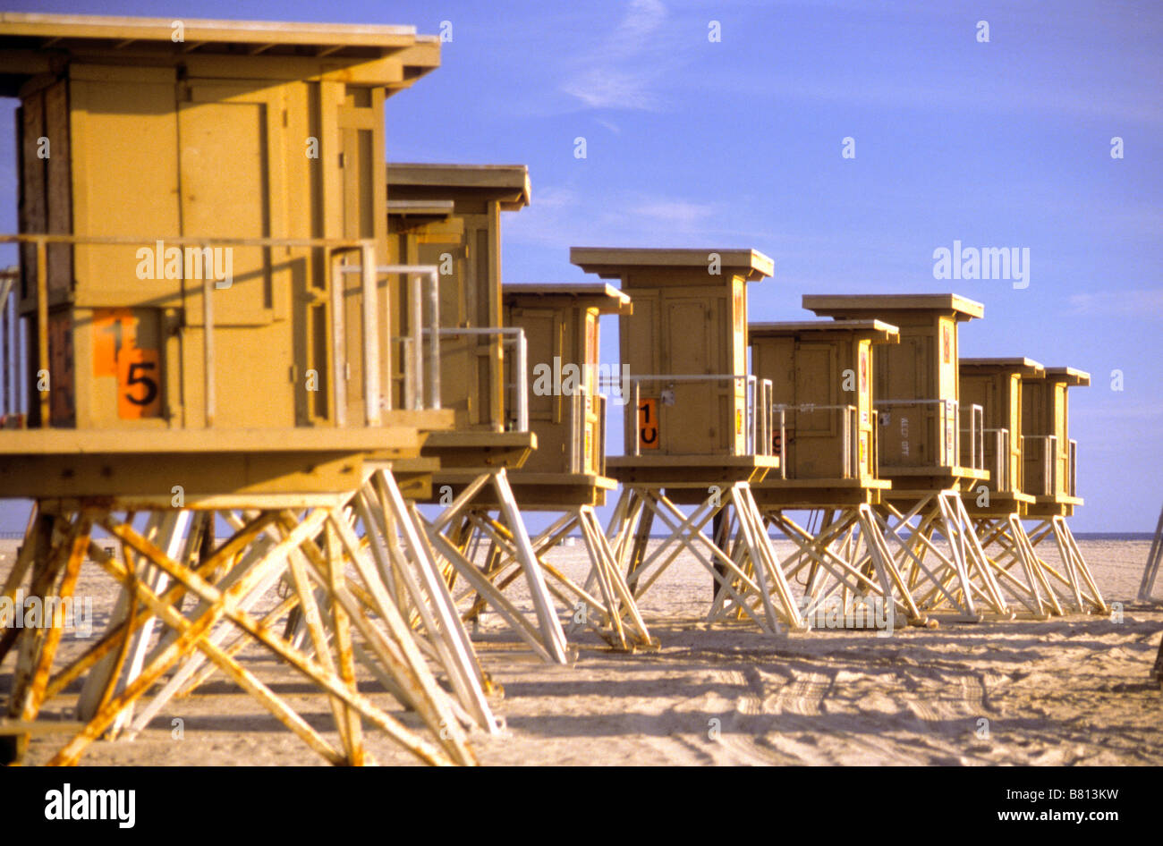 Empty lifeguard towers wait for summer on a Southern California beach. Stock Photo