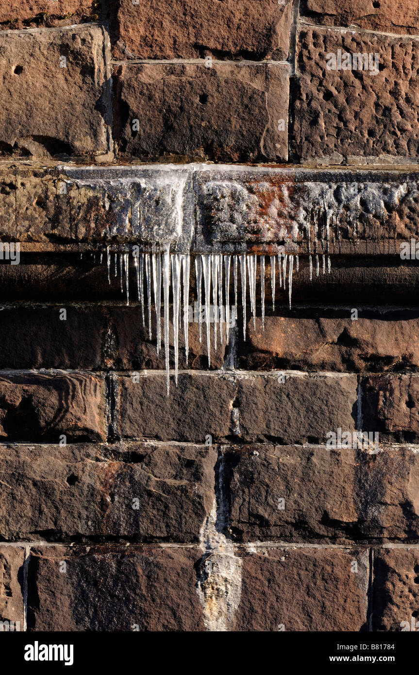 Icicles on a viaduct Stock Photo