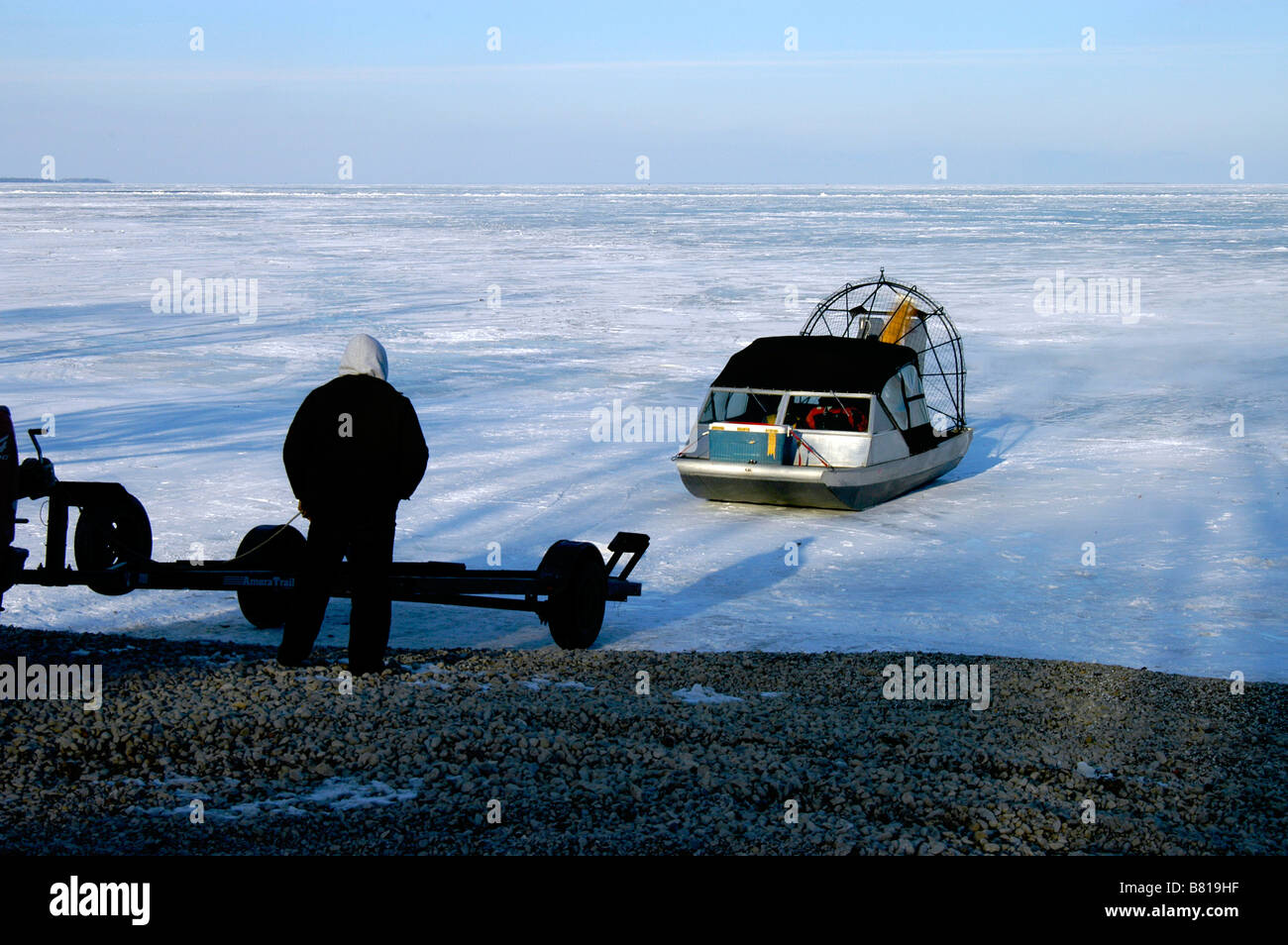 air boat coming off of Lake Erie ice and heading for its trailer Stock Photo