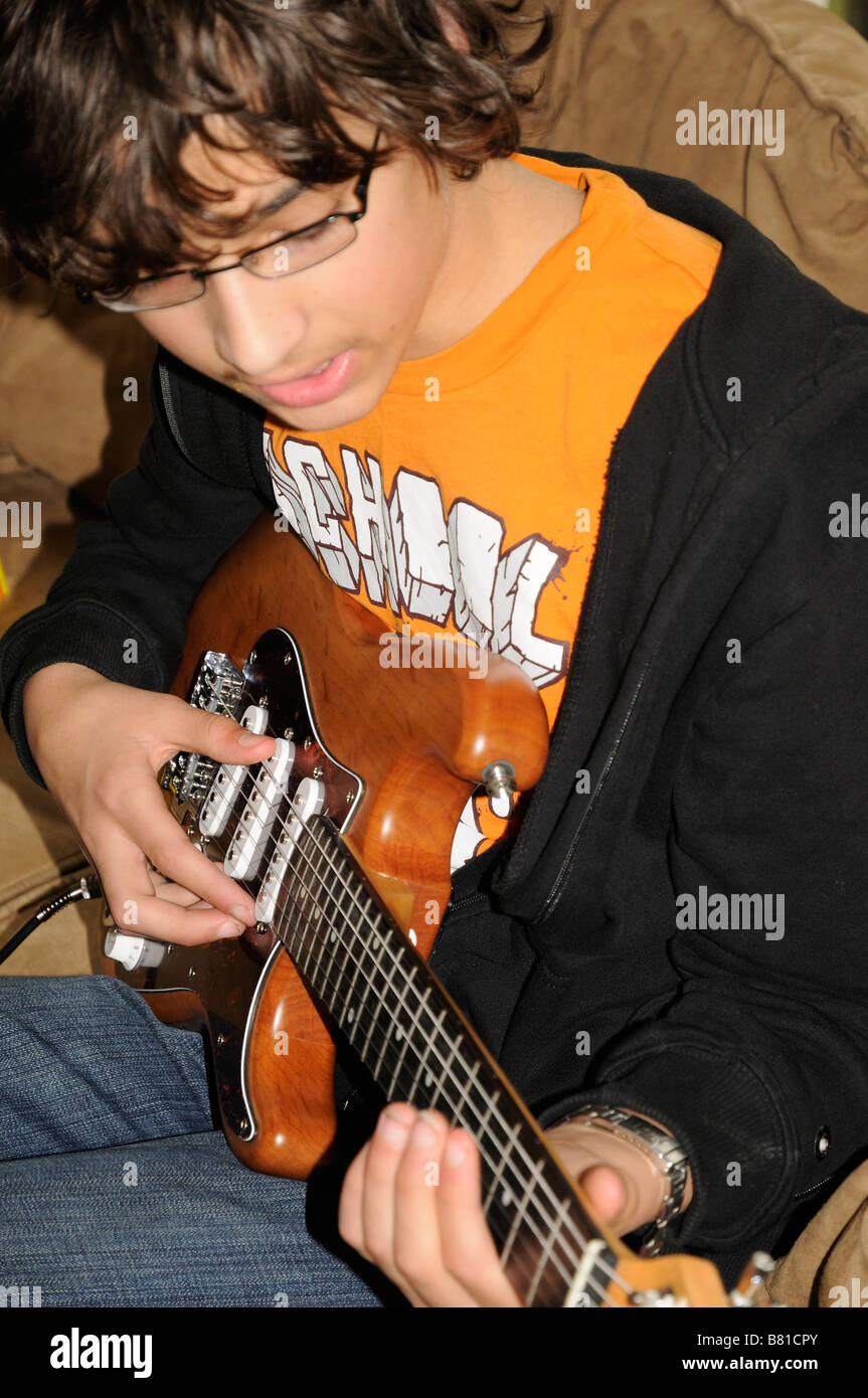Teenager Playing an Electric Guitar Stock Photo Alamy