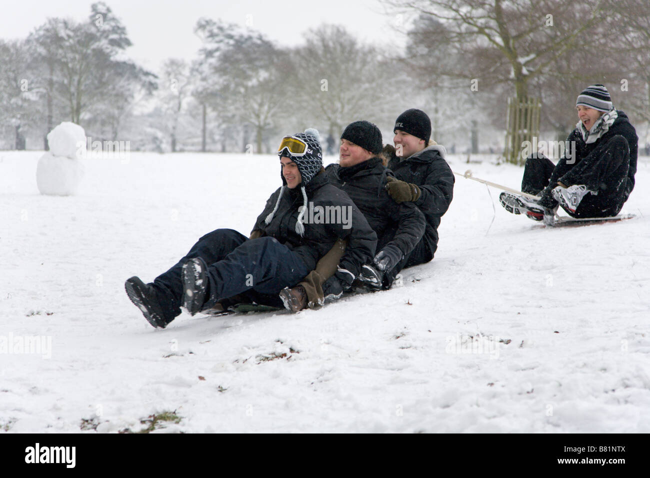Tobogganing during severe english winter hi-res stock photography and ...