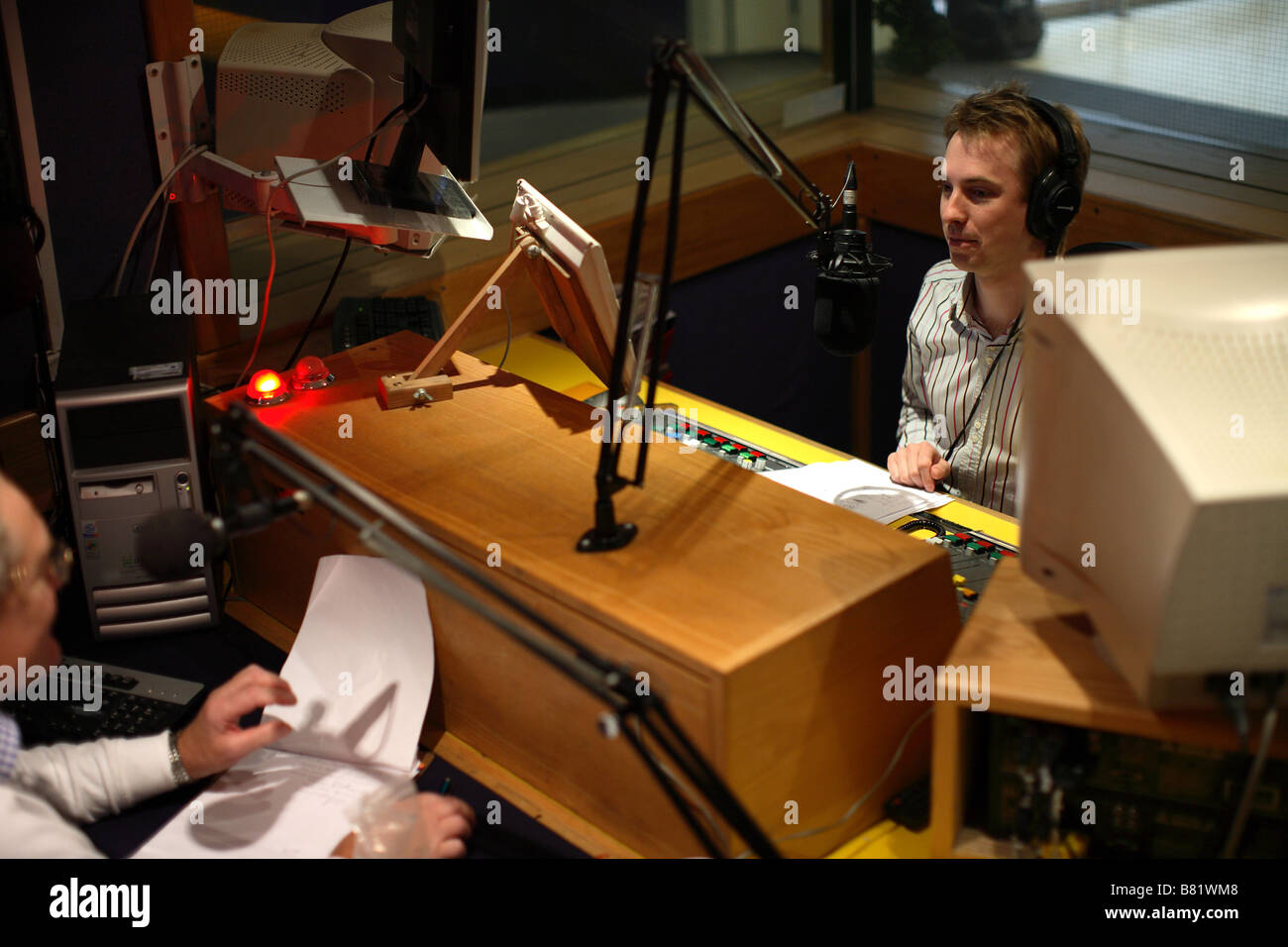 Radio programme being broadcast from studio Stock Photo Alamy