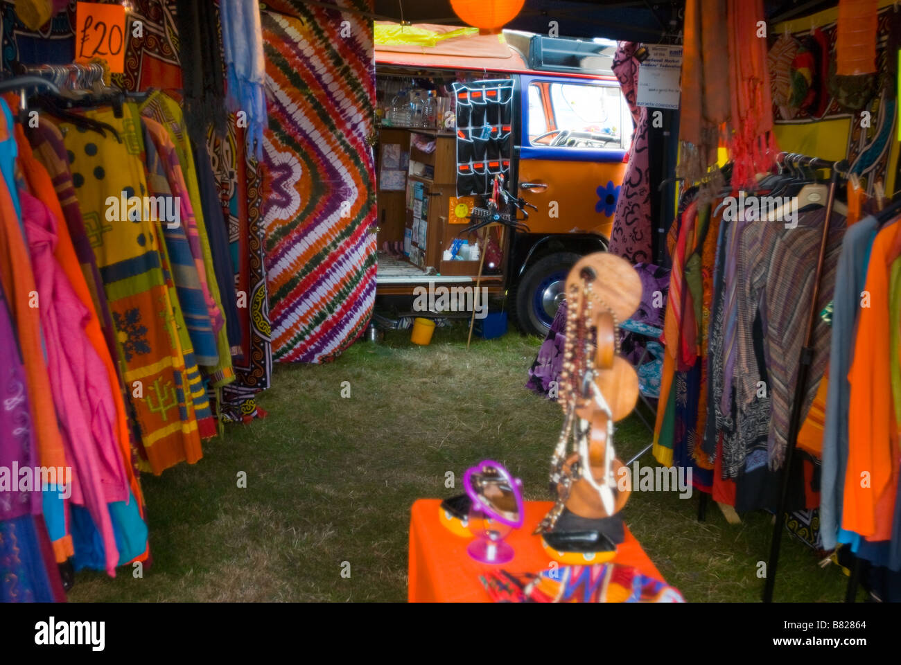 hippy festival clothes shop with vw campervan Stock Photo Alamy
