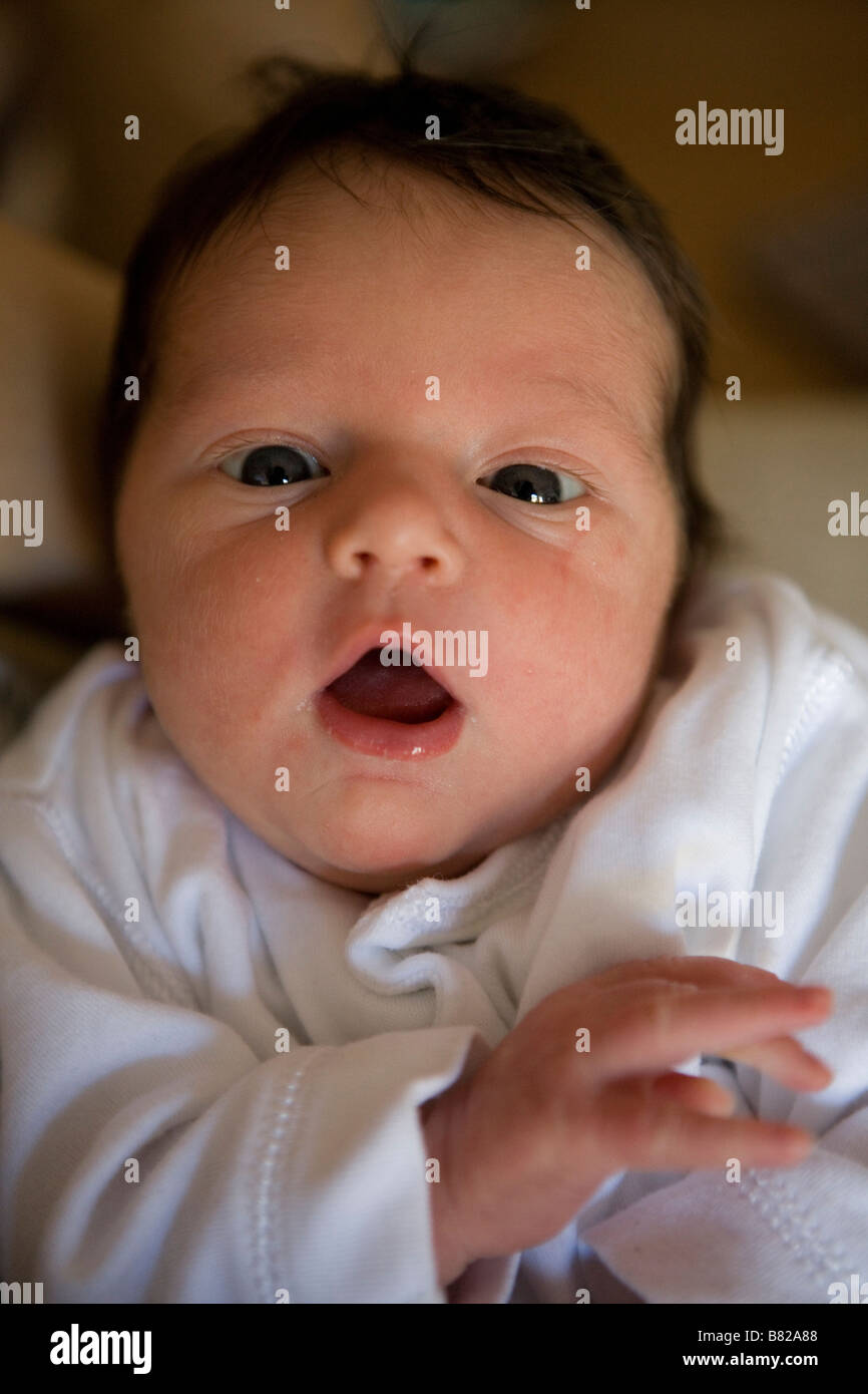 A baby with mouth open Stock Photo Alamy