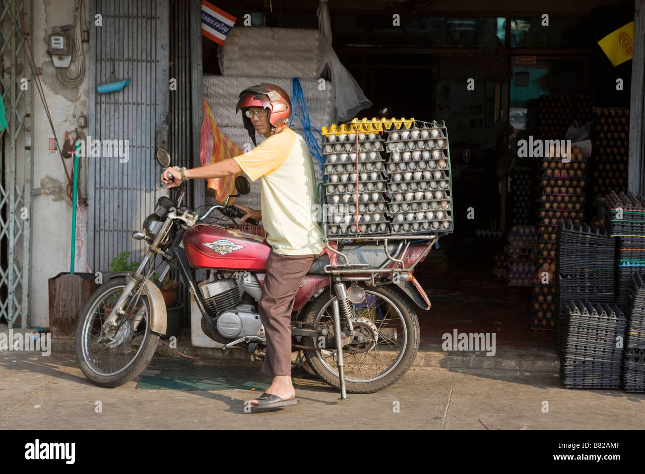 Motorcyclist Delivering Egg Crates Bangkok Thailand Stock Photo