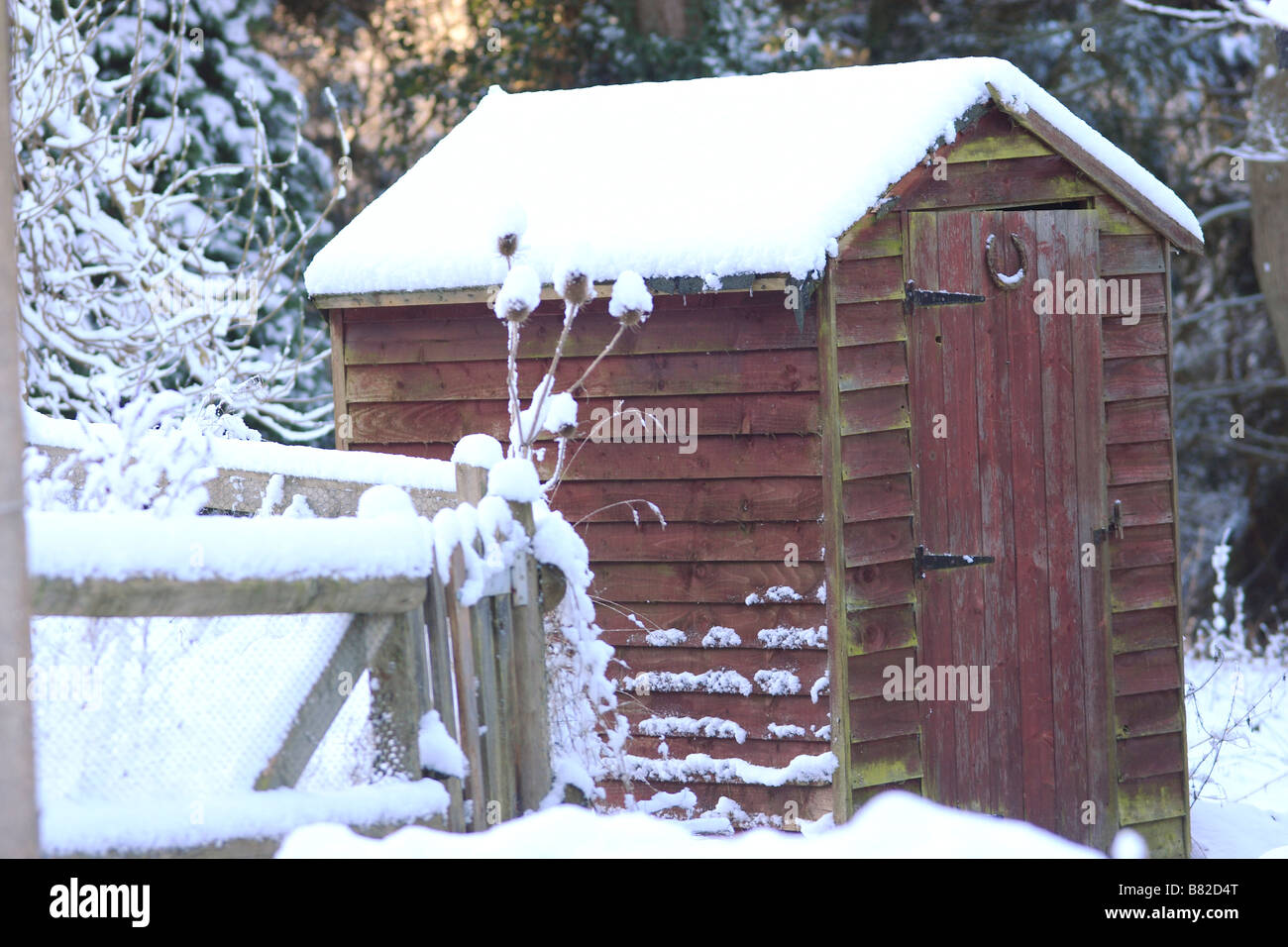 Snow covered shed Stock Photo Alamy