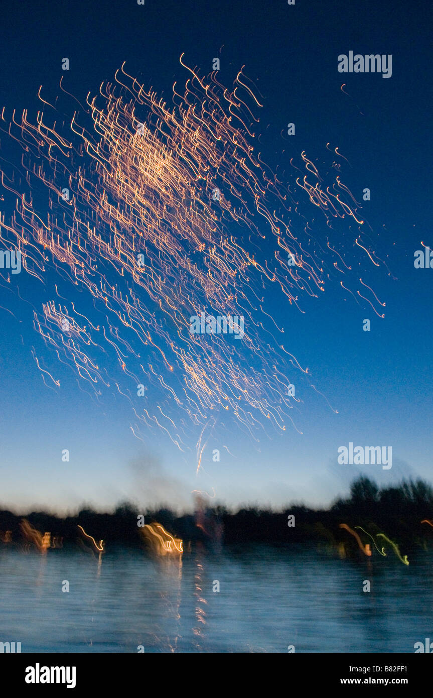 July Fourth fireworks time exposure Big Pine Lake Minnesota Stock Photo