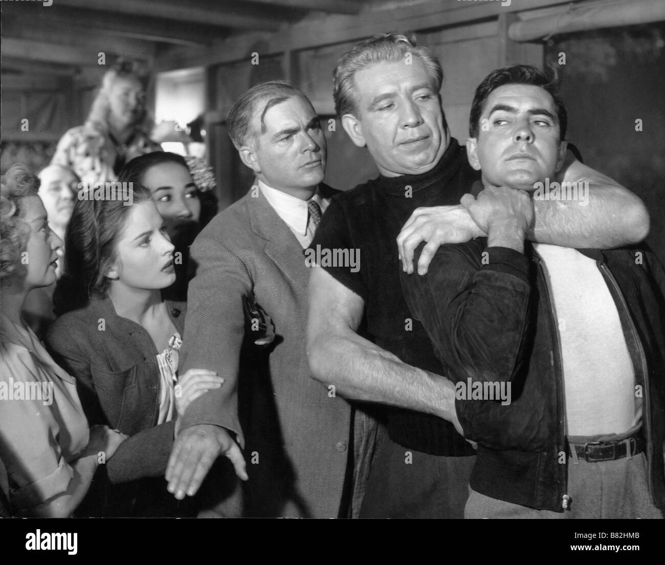 Nightmare Alley  Year: 1947 USA Mike Mazurki , Tyrone Power , Coleen Gray , Joan Blondell , James Flavin  Director: Edmund Goulding Stock Photo