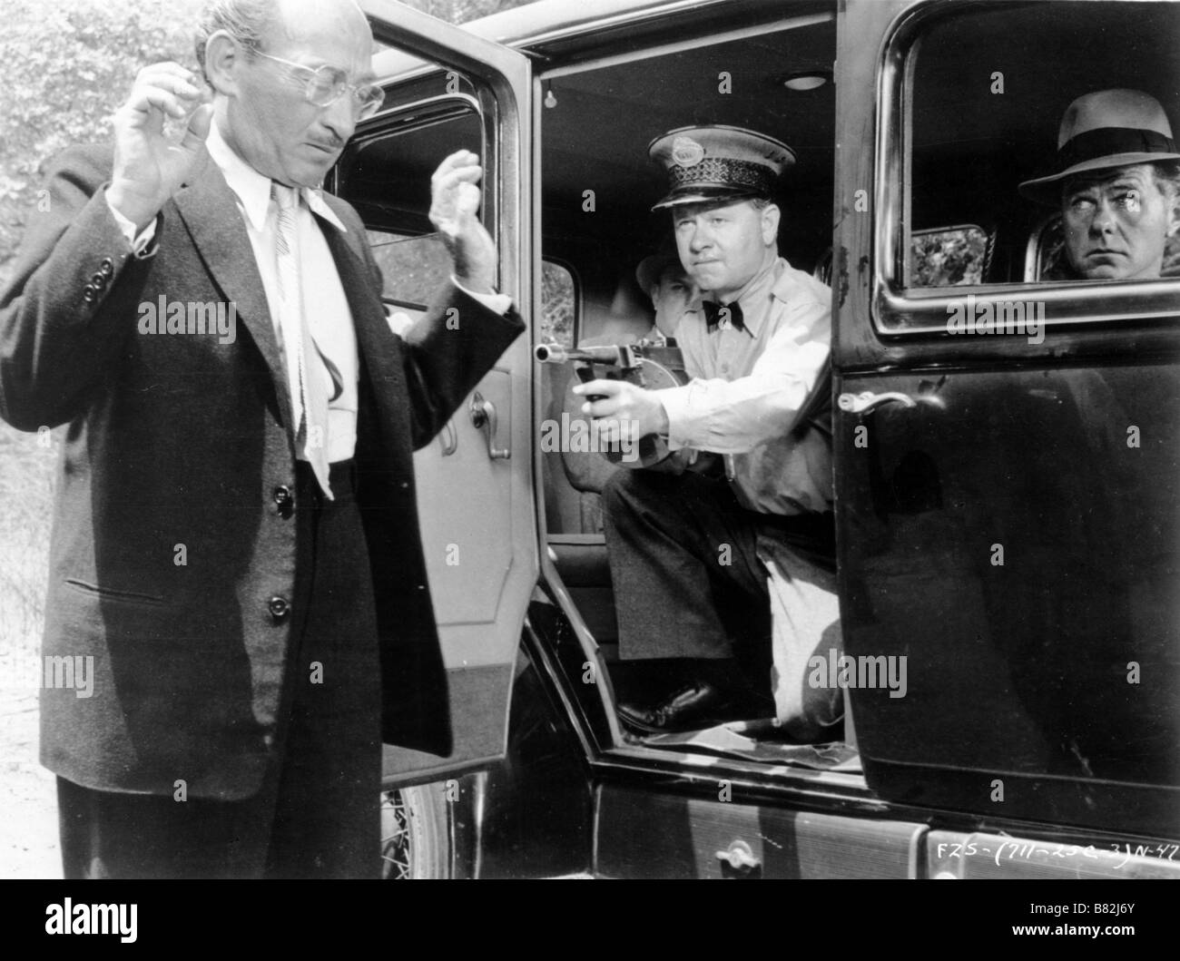 Baby Face Nelson  Year: 1957 USA Director: Don Siegel Mickey Rooney , Elisha Cook Jr. Stock Photo