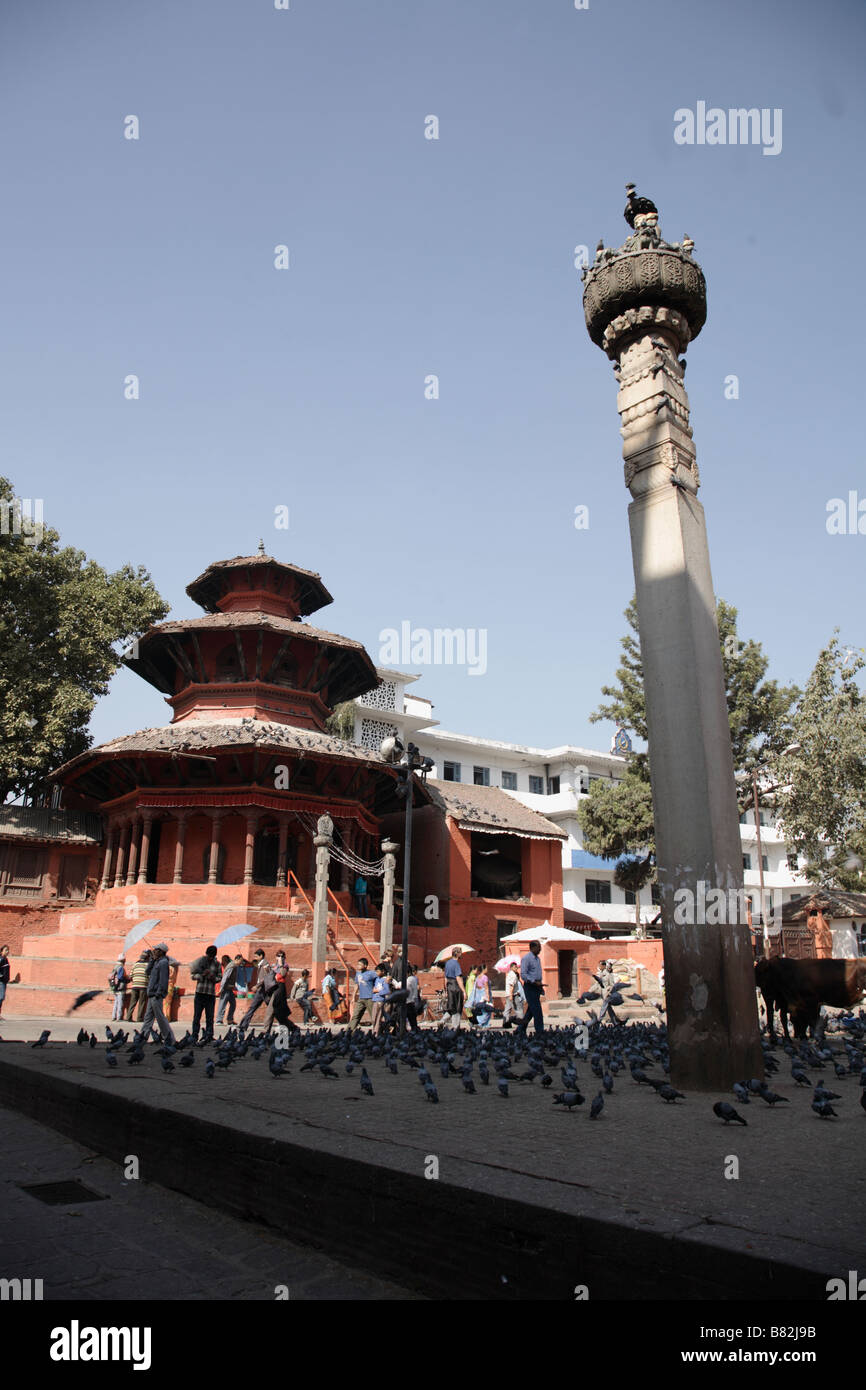 Chyasin Dega in Durbar Square Kathandu. King Prata Malla's Column in the foreground Stock Photo