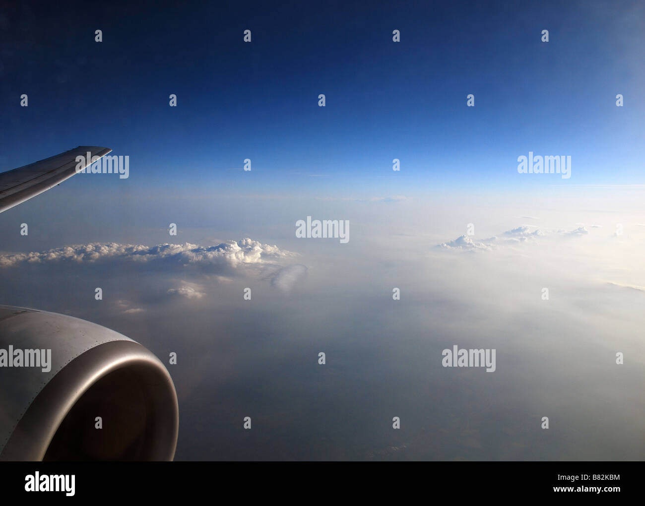 View from an aircraft over the cloud layers Stock Photo
