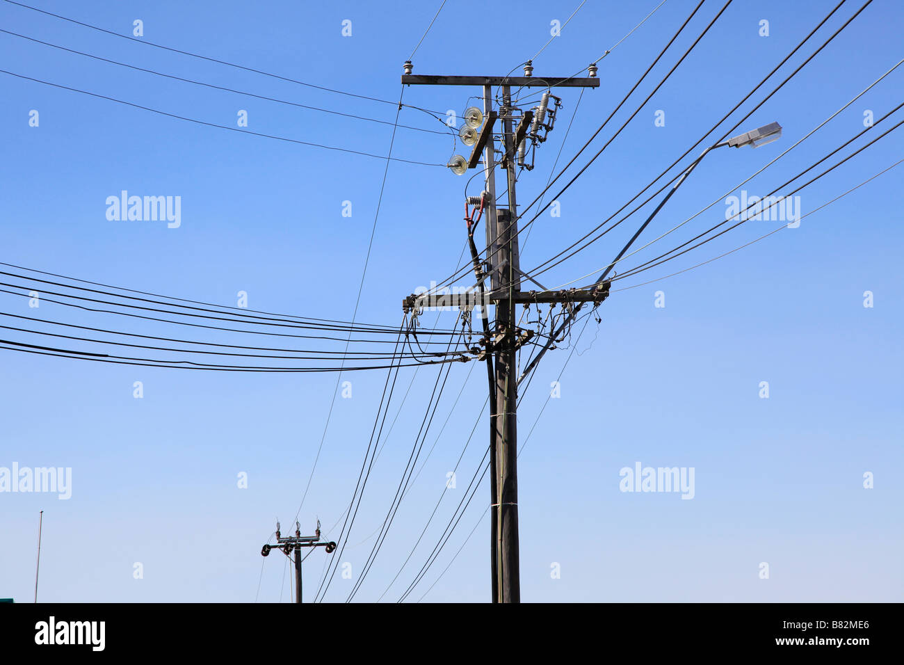 Close up of wooden power pole with lines,Timaru,Canterbury,South Island