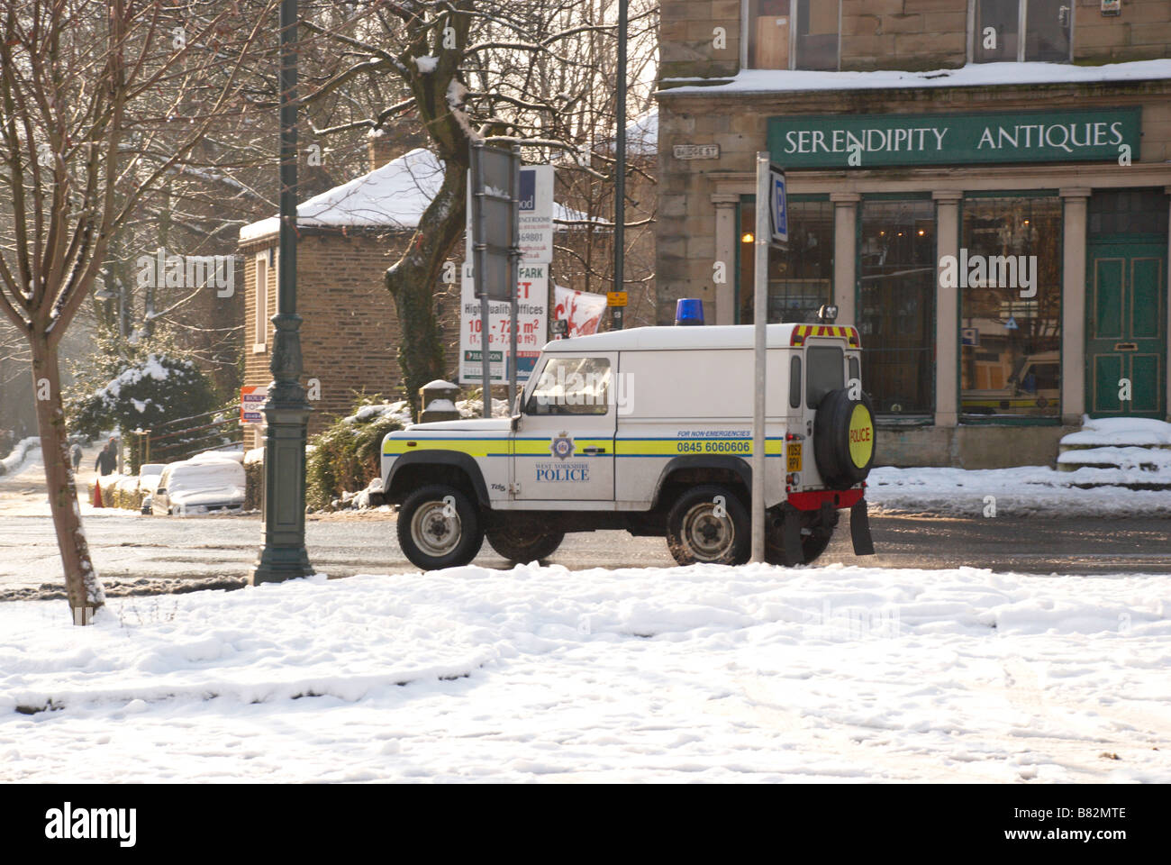police land rover in the snow Stock Photo