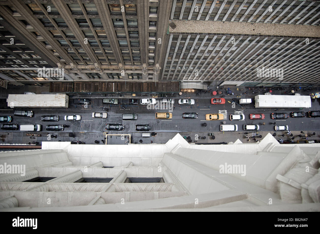 View Downwards towards Street from New York City Skyscraper, NYC USA Stock Photo